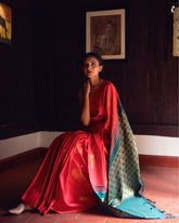THE BANARASI SAREEIS MADE UP OF SILK THREADS WOVEN USING