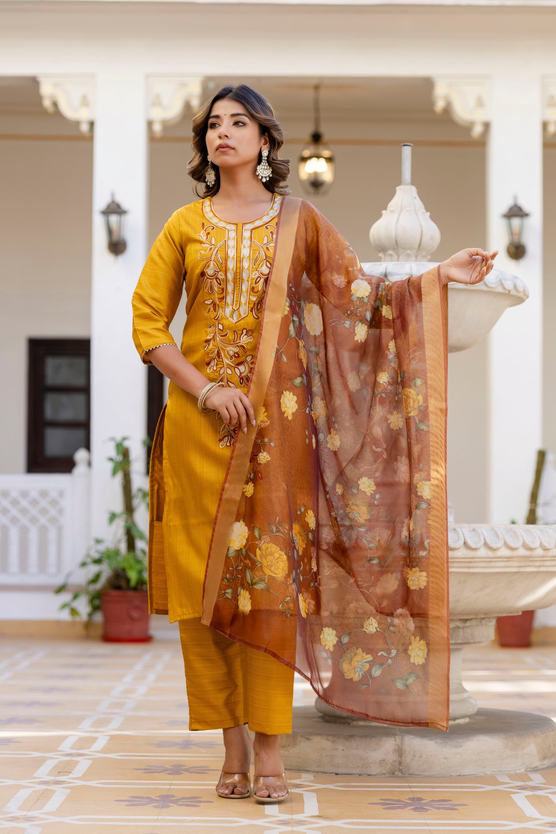 YELLOW  COLOURED WOMEN'S  P0LYSTER  KURTA WITH  DUPATTA SET