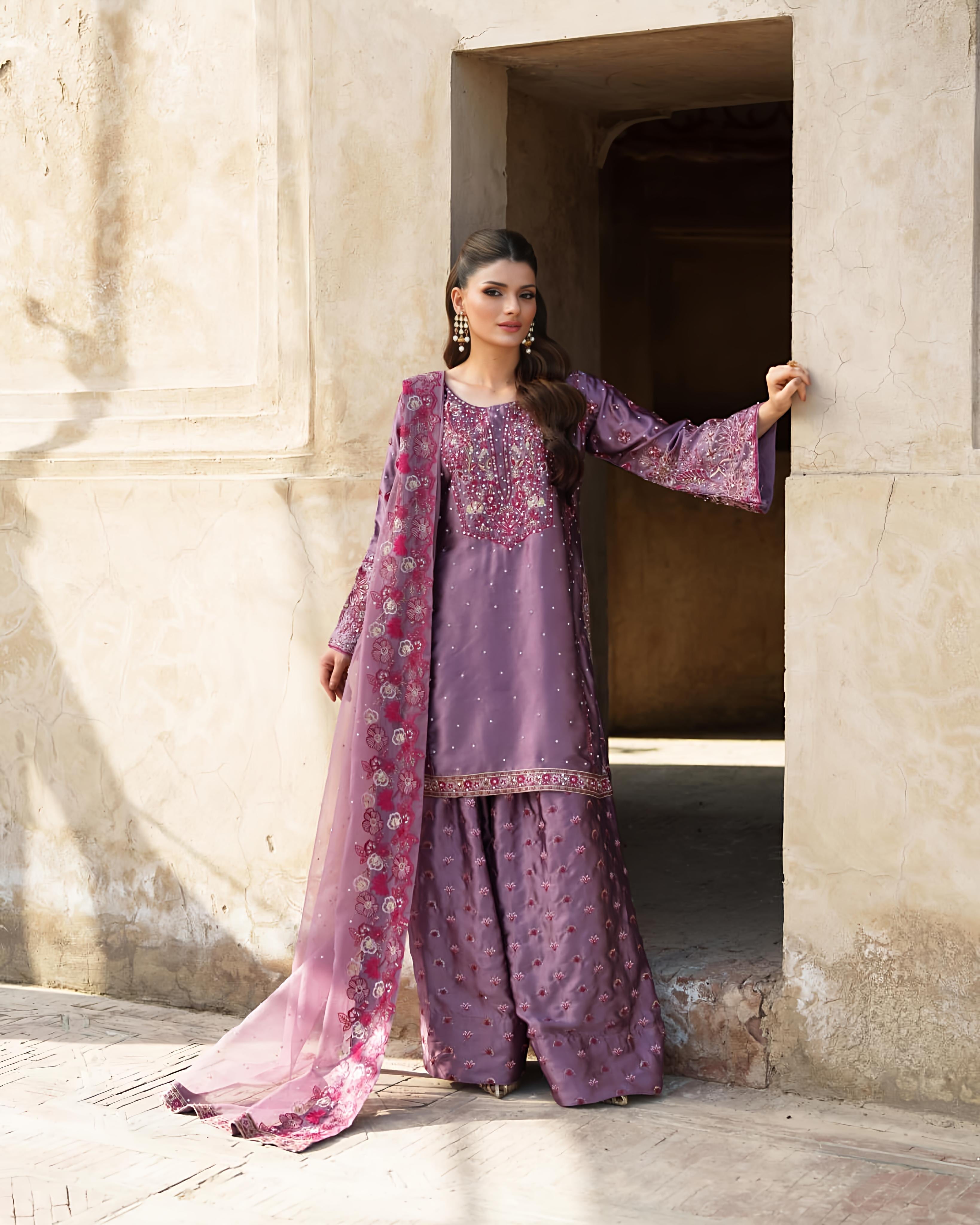 'Grace in Lavender Woman in Embroidered Traditional Outfit at the Stadium'