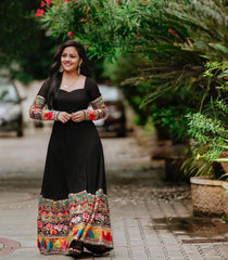 ARRESTING BLACK COLORED BEAUTIFULL EMBROIDERY FLOOR TOUCH GOWN