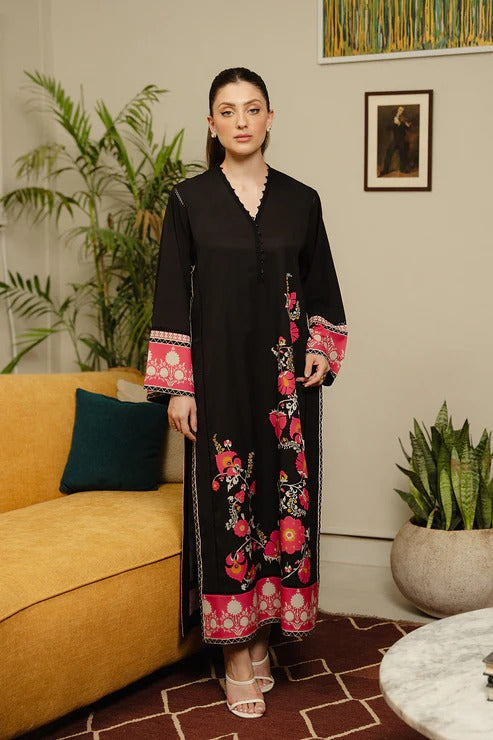Black top made in soft crepe fabric in floral print.