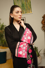Black top made in soft crepe fabric in floral print.