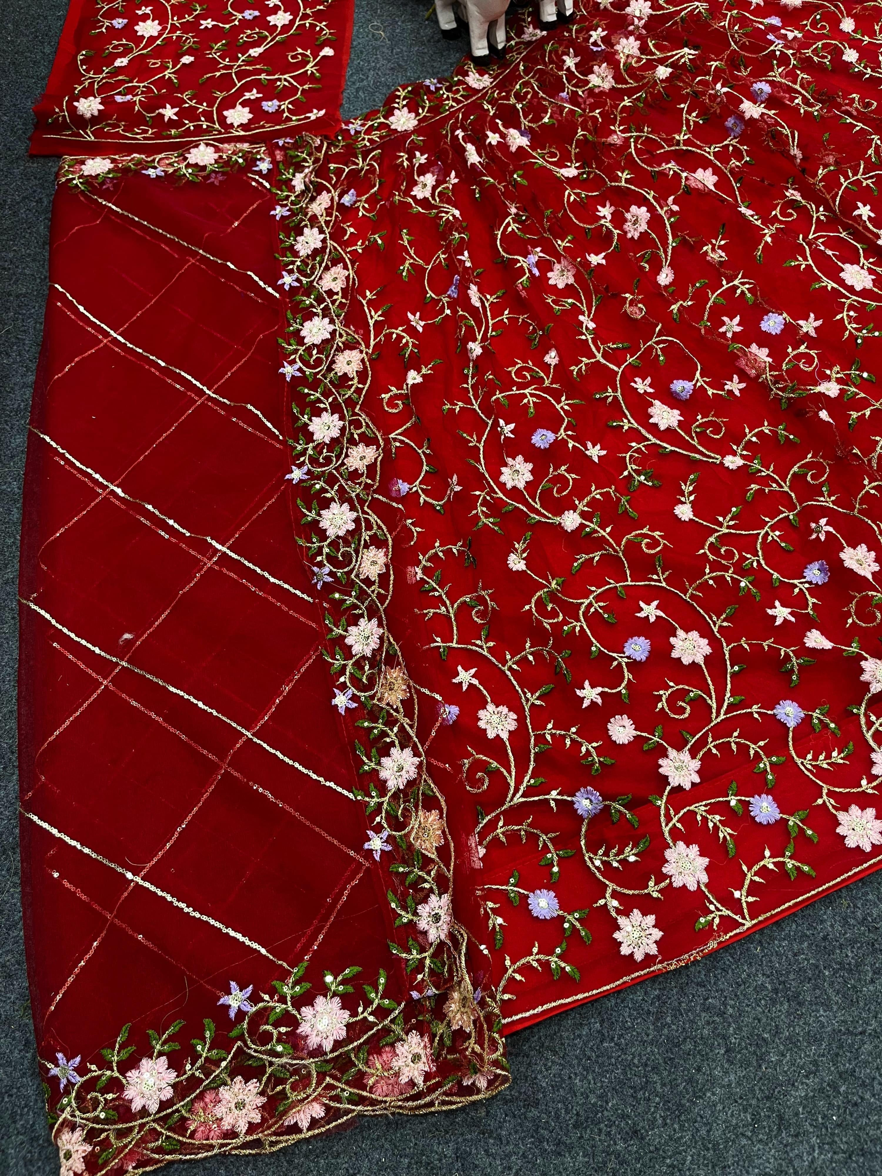 Red color soft net embroidered lehenga choli for women